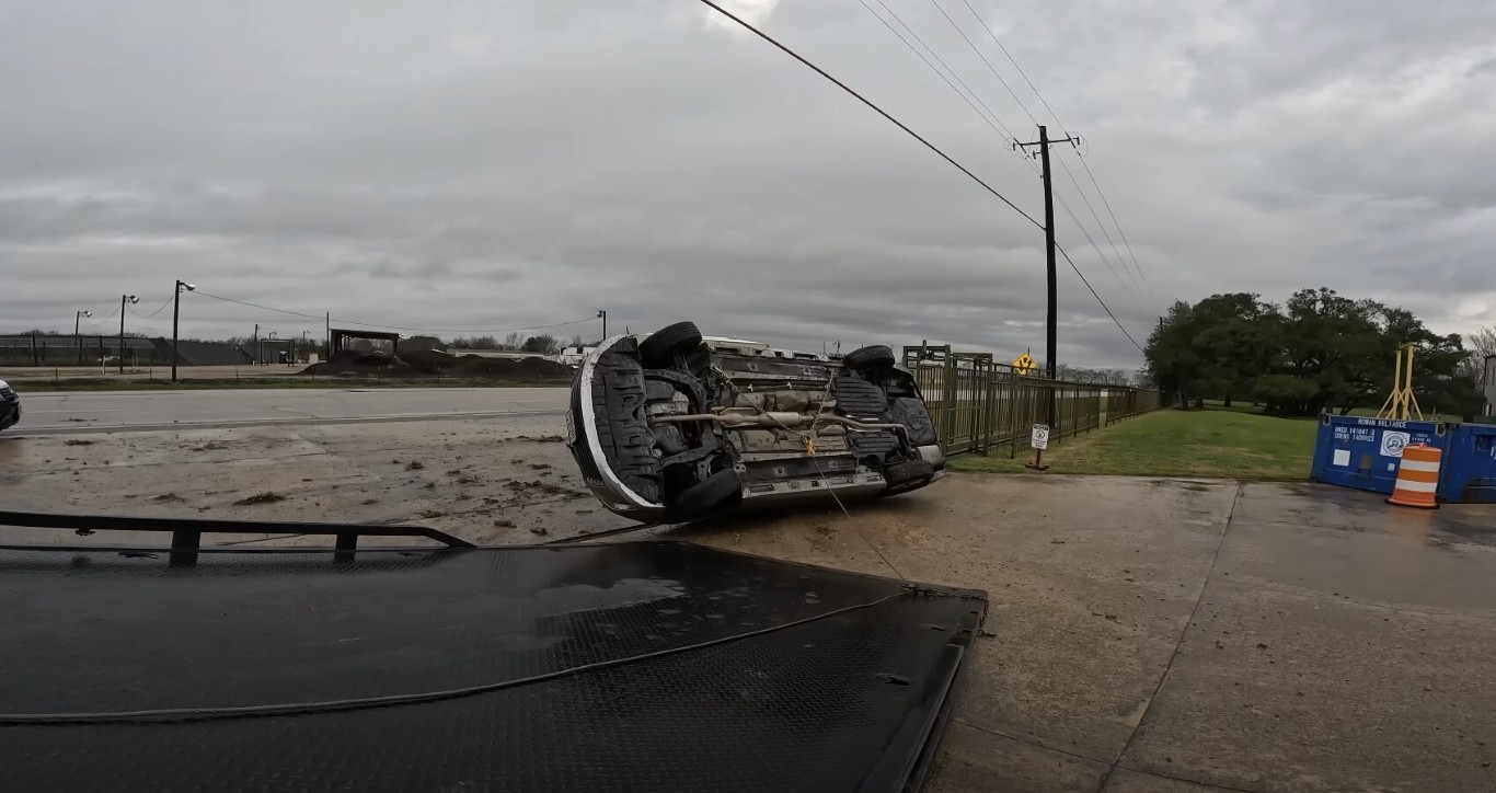 Accident recovery and winching service for overturned vehicle in Pembroke Pines, FL