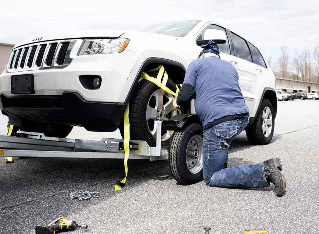 Motorcycle towing with secure vehicle straps in Pembroke Pines, FL